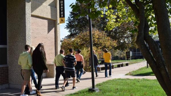 students on tour of QC Campus outside Building 1