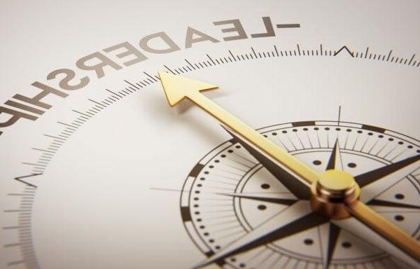 compass pointing to the word leadership